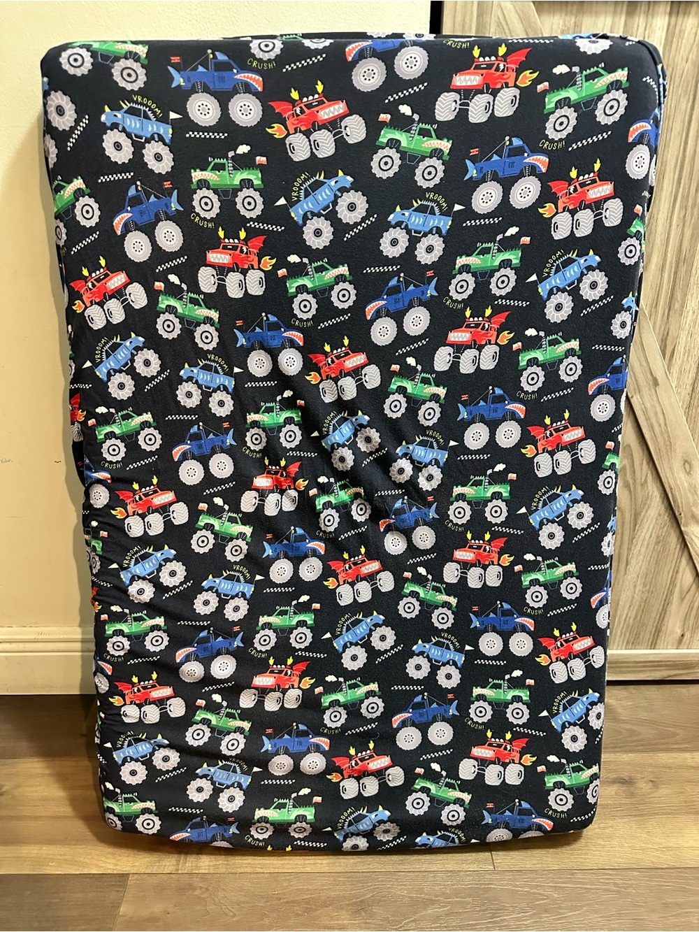 Little Sleepies Monster Truck Crib  sheet- Black with Red, Green & Blue trucks